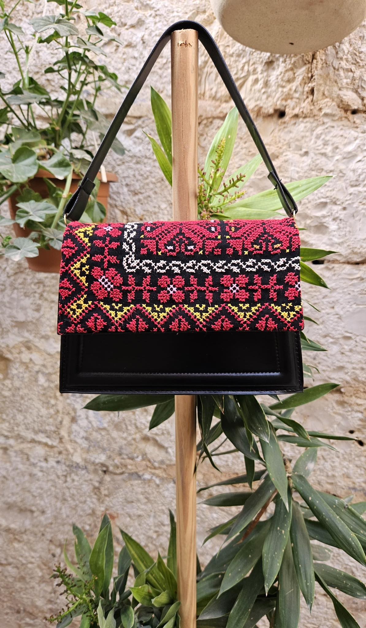 Black Handbag with Bold Red Palestinian Embroidery and Yellow Accents – Heritage Elegance